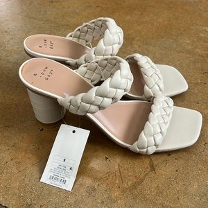 Selling “a new day” small heels. These have never been worn.